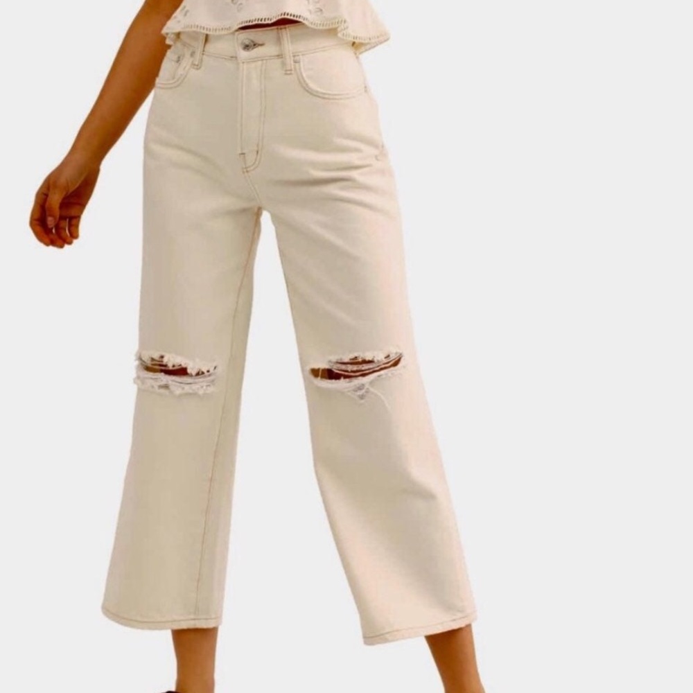 Free people ripped flare jeans